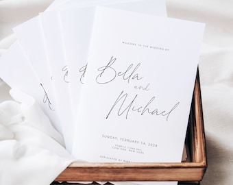 Può includere: Un mazzo di programmi di cerimonia di nozze bianchi con il testo "Benvenuti al matrimonio di Bella e Michael" e la data "Domenica 14 febbraio 2024".