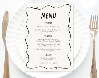May include: A black and white menu with a handwritten font. The menu is titled "MENU" and lists the following items: Starter, To Share, and Dessert. The starter is feta cheese and caramelized onion tart. The To Share section includes roast chicken with herb butter, mashed potatoes and seasonal vegetables, baked salmon with lemon dill sauce, new potatoes and green beans, and wild mushroom risotto with parmesan crisp and truffle oil. The dessert is vanilla panna cotta with berry compote and pavlova with seasonal fruit.