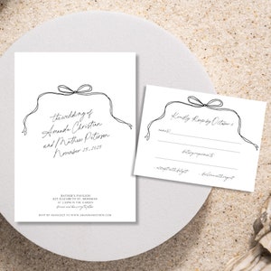 May include: A wedding invitation with a simple black and white design. The invitation features a hand-drawn bow and the text "the wedding of Amanda Christan and Mathew Peterson November 25, 2025". The RSVP information is included at the bottom of the invitation.