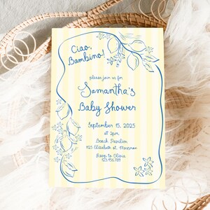 May include: A yellow and white striped baby shower invitation with blue text and illustrations of lemons and flowers. The text reads "Ciao, Bambino!" and "Samantha's Baby Shower". The invitation includes the date, time, location, and RSVP information.