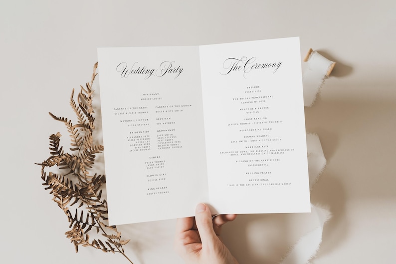 May include: A white folded wedding program card featuring black serif and script typography. The left panel is titled Wedding Party and the right panel is titled The Ceremony, listing various roles and names in a clean, minimalist layout.