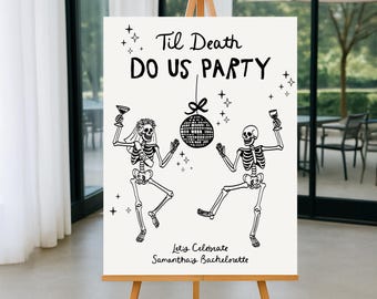 May include: A white sign on a wooden easel with the text "Til Death DO US PARTY". The sign features black illustrations of dancing skeletons, a disco ball, and the text "Let's Celebrate Samantha's Bachelorette".