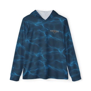 May include: Blue long-sleeve hooded shirt with a wave pattern and the text "HAWAII EKOI EXPERIENCE" on the front.