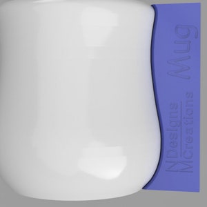 May include: A white ceramic mug with a blue label that says "Mug" and "Designs by Creations".