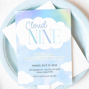 May include: A light blue birthday invitation with the words "Cloud Nine" in a cloud-shaped design. The invitation includes details for Brielle's 9th birthday, with the date, time, and RSVP information. The invitation is on a light blue plate.