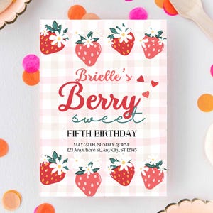 May include: A pink and white gingham birthday invitation with strawberry illustrations. The text reads "Brielle's Berry Sweet Fifth Birthday" with event details. Decorative elements include pink and orange confetti.