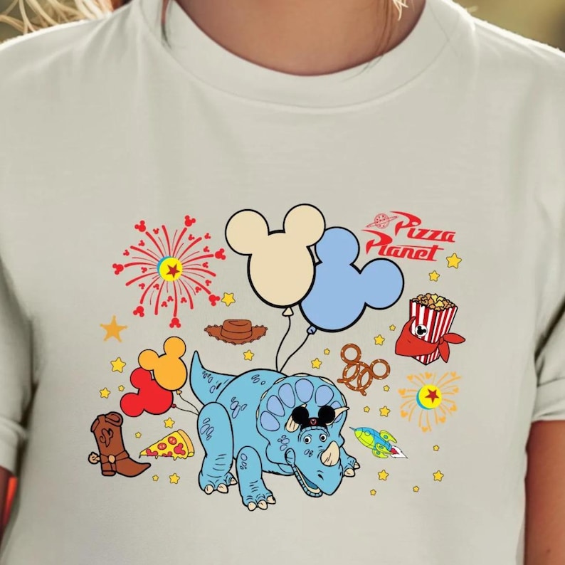 a woman wearing a mickey mouse ears shirt