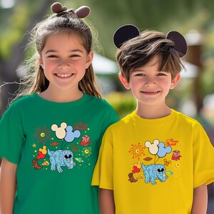 a couple of kids standing next to each other