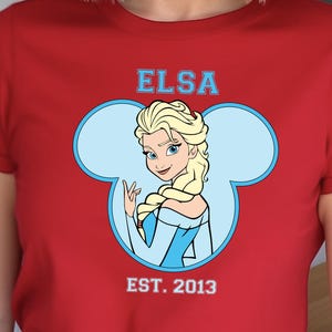 Elsa in Mouse Ears T-shirt, Frozen-Inspired T-shirt, Perfect Disney Fan Gift, Ideal for Family Vacation, Unisex Disney Style Shirt