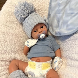 Used silicone baby dolls deals