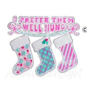 May include: A decorative Christmas-themed banner with three stockings. The banner reads "I PREFER THEM WELL HUNG" in pink letters. The stockings are white with pink and teal accents.