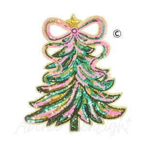 May include: A sequined Christmas tree applique in pink, green, and gold. The tree features a bow at the top and is outlined in gold sequins. The design is on a white background.