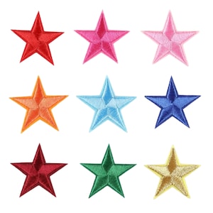 May include: Nine embroidered iron-on patches in the shape of stars. The stars are in various colors including red, pink, orange, light blue, dark blue, maroon, green, and gold.