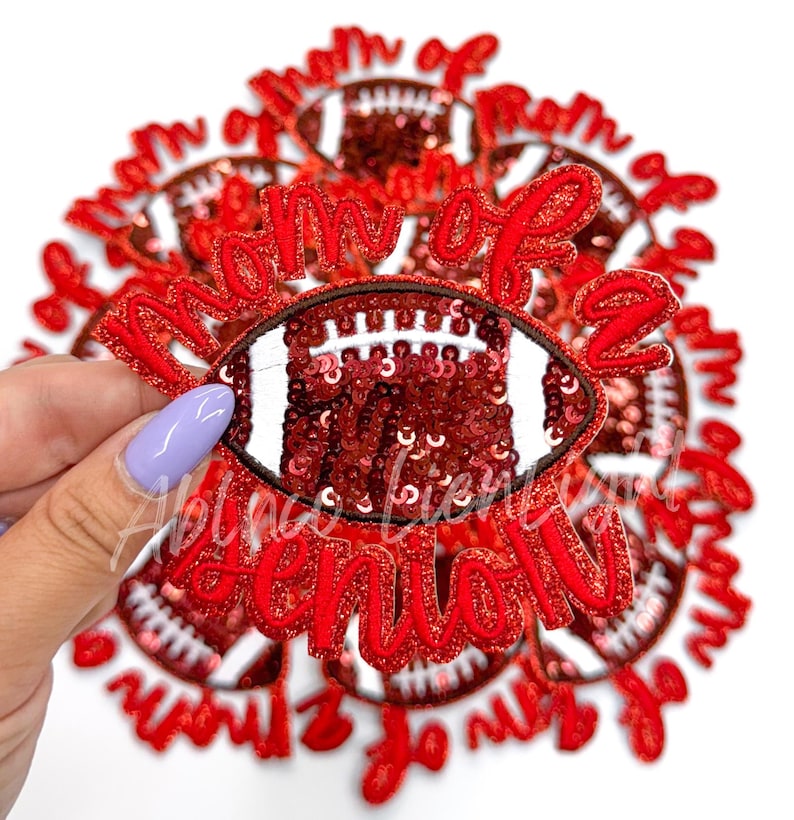 May include: Red and white iron-on patch with the text "Mom of a Senior" and a red sequined football.