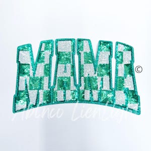 May include: A green and white sequined patch that says "MAMA" in large, bold letters. The patch is perfect for adding a personal touch to clothing, bags, or other accessories.