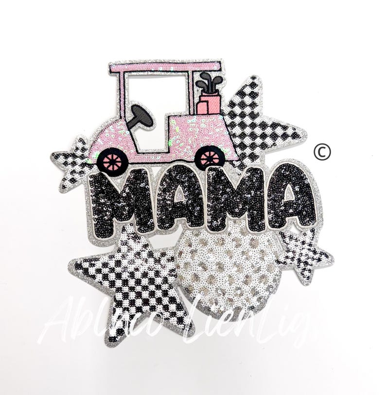 May include: A pink golf cart with a black and white checkered star and the word "MAMA" in black sequins. The design is surrounded by silver sequins.