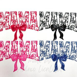 May include: Four iron-on patches with the word "MAMA" in white letters with a floral pattern. Each patch has a different colored bow: pink, black, hot pink, and blue.
