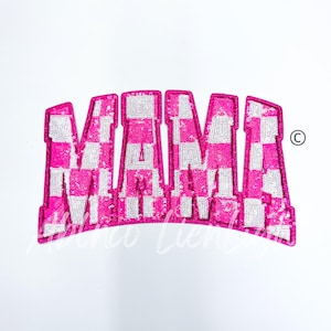 May include: Pink and white checkered sequin iron-on patch that says "MAMA" in large letters.