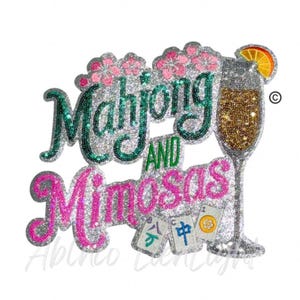 May include: Glittery graphic with the words "Mahjong and Mimosas" in green and pink. A champagne flute with an orange slice and three Mahjong tiles are also featured. The design is embellished with glitter.