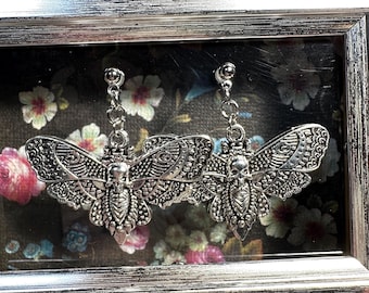 Skeleton Head Moth earrings. These are fun and a little creepy. Perfect for Halloween or every day.