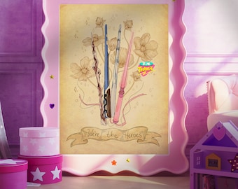 May include: A framed print with a vintage aesthetic featuring four wands and a banner that reads "We're the Heroes". The background is a light brown with floral designs. The print is framed in a pink frame with a scalloped edge.