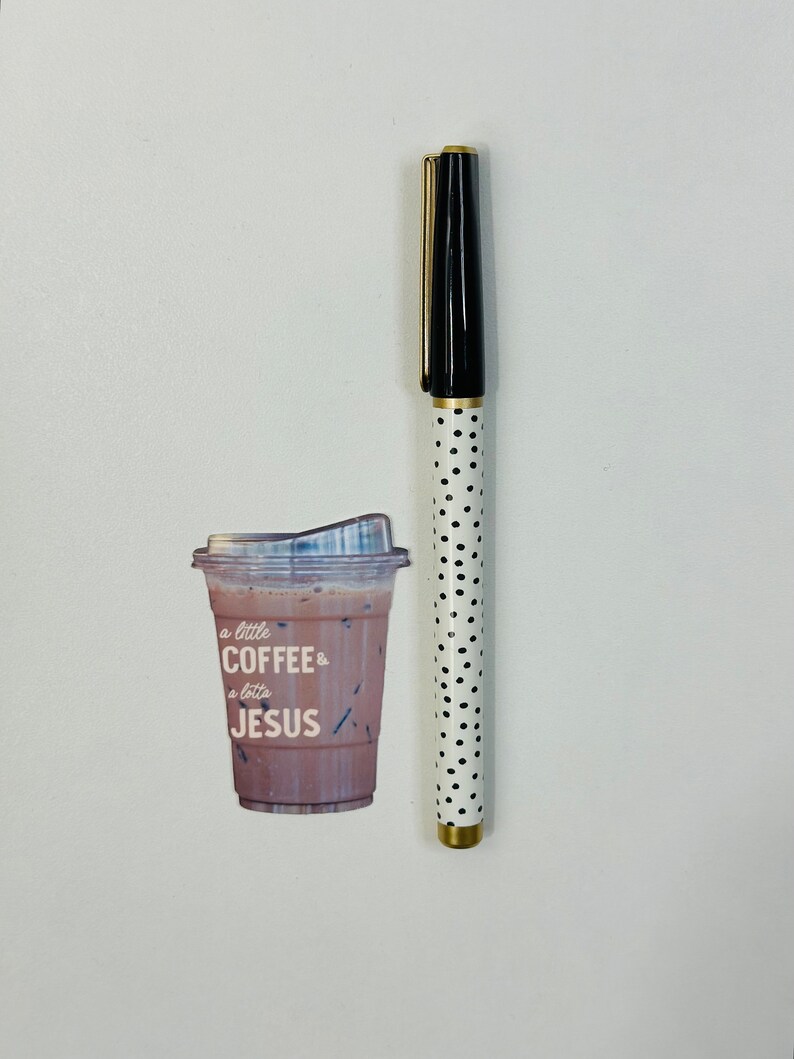 May include: A white sticker with a picture of a coffee cup and the text "a little COFFEE & a little JESUS".