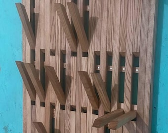 Wall-mounted organizer, coat rack, natural wood, brown. Original hanger. Ash hanger. Piano.Light oak.