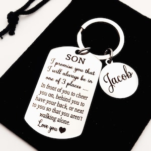 May include: Silver keychain with a dog tag that reads "SON I promise you that I will always be in one of 3 places... In front of you to cheer you on, behind you to have your back, or next to you so that you aren't walking alone. Love you" and a smaller tag that reads "Jacob".