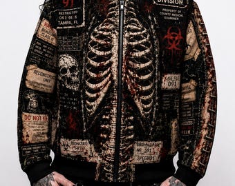 May include: A black bomber jacket featuring a detailed graphic print of a human rib cage and spine. The design includes various text elements like Autopsy Division, biohazard symbols, and case file labels in shades of red, beige, and black.