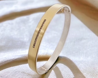 Timeless bangle with brownish diamond made of 750 yellow gold and 925 silver