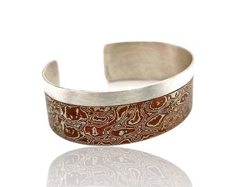 Bangle made of Mokume Gane silver and copper