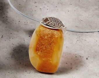 High quality amber pendant with Mokume Gane