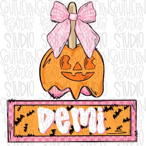 May include: A digital illustration of an orange jack-o'-lantern candy apple on a stick, topped with a pink gingham bow. Below, a rectangular sign with a pink gingham border and an orange background featuring black bats displays the name demi.