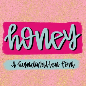 May include: A pink background with gold glitter. The word "honey" is written in a light blue handwritten font on a bright pink rectangle. Below the rectangle is a light blue rectangle with the text "A handwritten font".