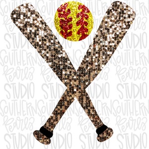 May include: Two gold glitter baseball bats crossed over each other with a yellow softball with red stitching in the center.