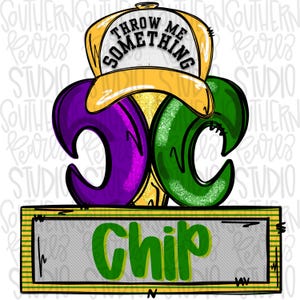 May include: A purple and green Mardi Gras fleur-de-lis with a yellow baseball cap on top. The cap says "Throw Me Something". A sign below says "Chip".