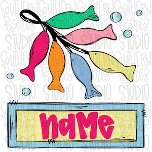May include: A colorful fish-shaped sign with the word "name" in pink letters on a blue and yellow background. The sign is decorated with a string of five fish, each a different color: green, pink, orange, blue, and yellow.