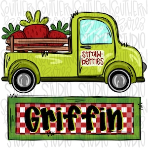 Puede incluir: Una camioneta vintage verde con una cama de madera llena de fresas rojas. La camioneta tiene un letrero que dice "fresas" y un letrero a cuadros rojos y blancos que dice "Griffin".