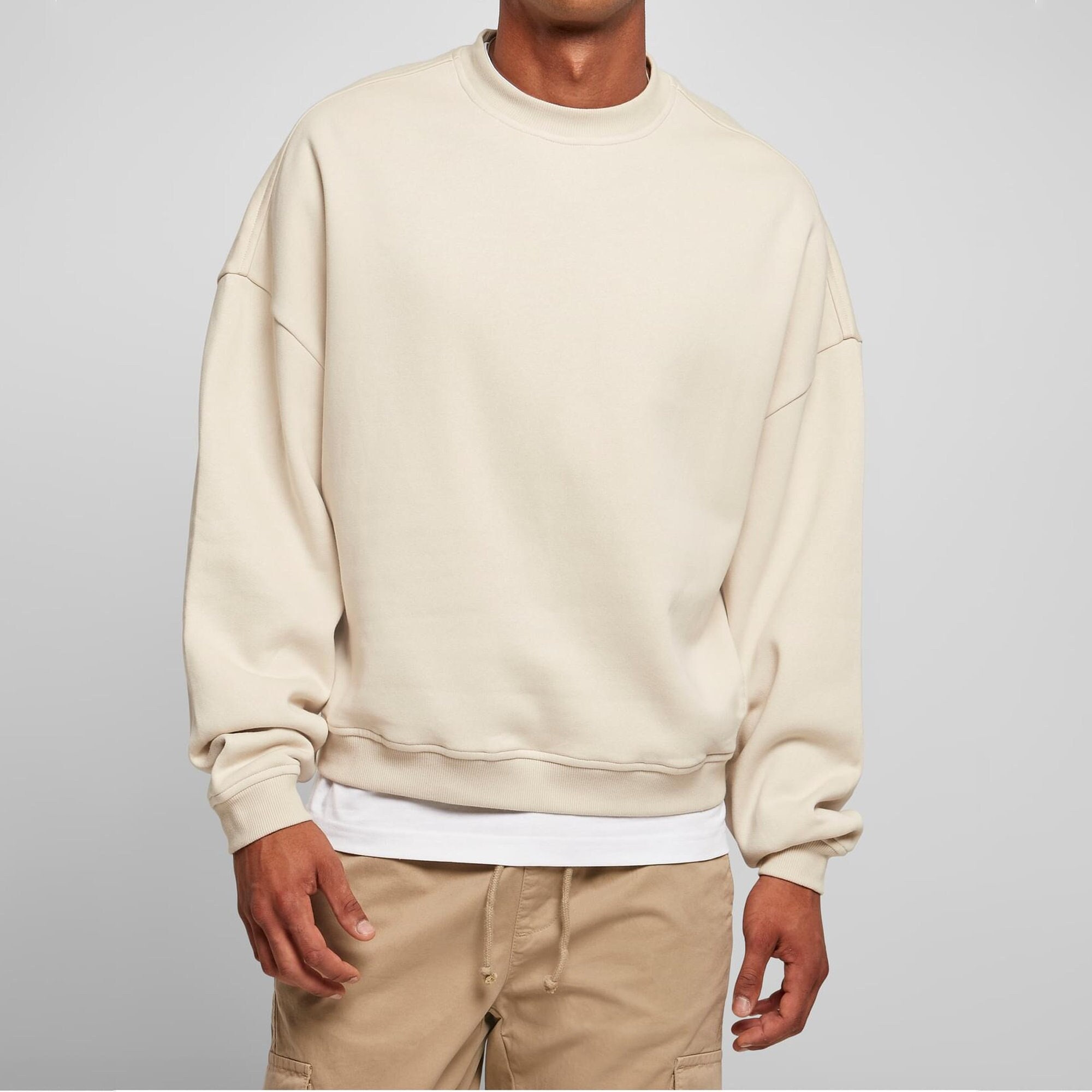 beige crewneck sweatshirt