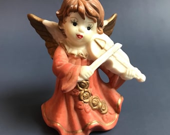 Ángel de cerámica vintage tocando el violín