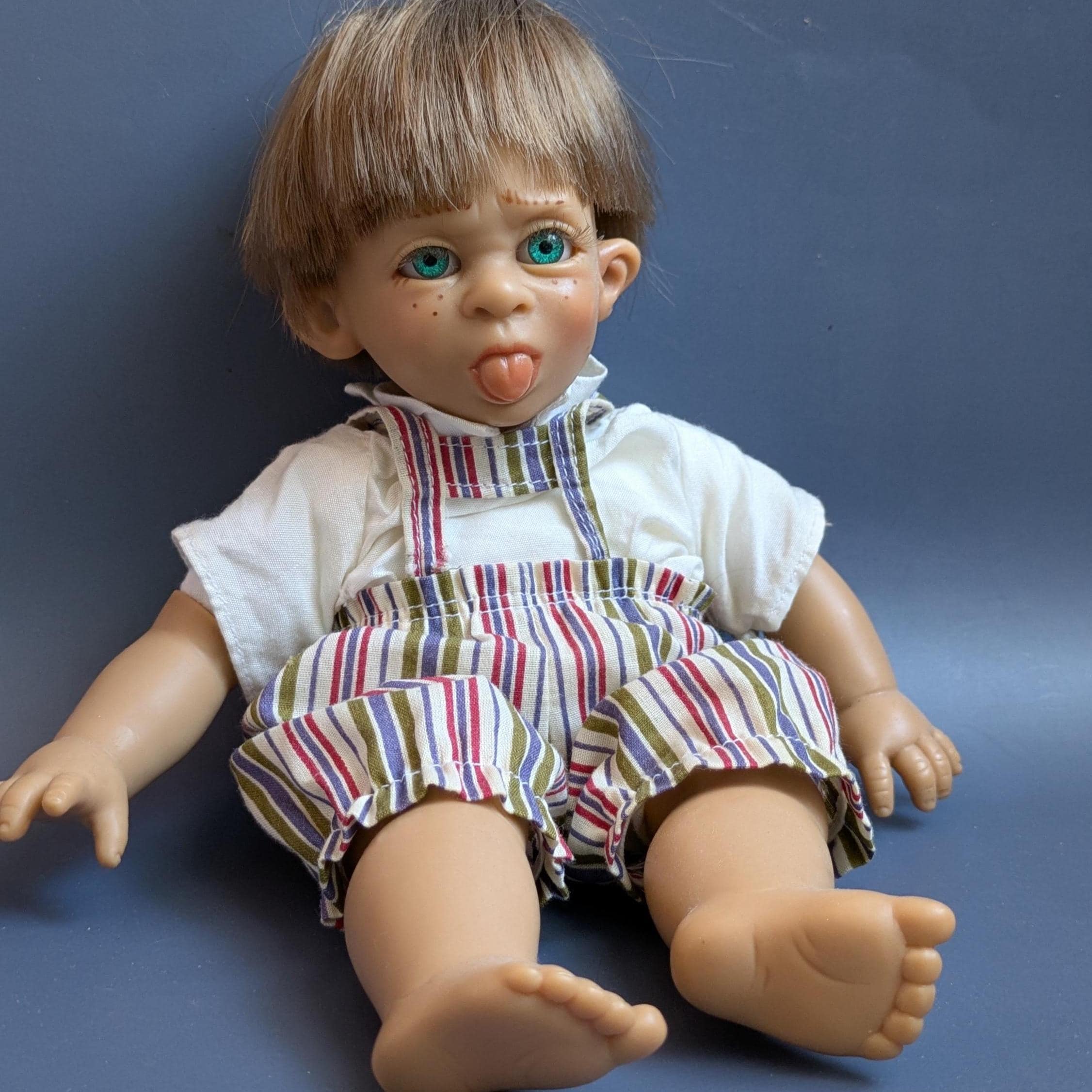 Vintage Doll With Tongue Sticking Out by D'anton Jos Collection
