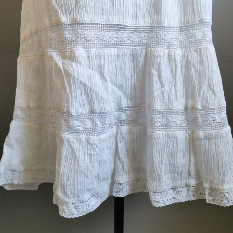 T-shirt détails fleurs blanc femme | Cache Cache