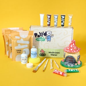 May include: A mushroom-shaped house craft kit with a box of white, brown, gray, black, and gold paint, a box of clay, a bottle of gloss varnish, a bottle of base coat, a sponge, a candle, and five tools. The box has the text "Potty's Projects" and "Mushroom Manor".