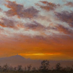 May include: An oil painting depicting a sunset with a vibrant orange and yellow horizon. Wispy clouds in shades of purple and pink fill the upper sky. A dark silhouette of a distant hill with a small structure on top sits above a dark tree line.