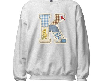 Sweater met patchwork initial K | Ronde hals met bloemengestikt monogram