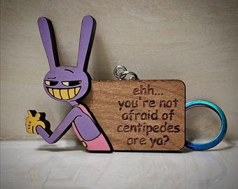 Jax Harmless Prank 木製手描きチャーム/ピン/マグネット (The Amazing Digital Circus にインスパイアされた作品)