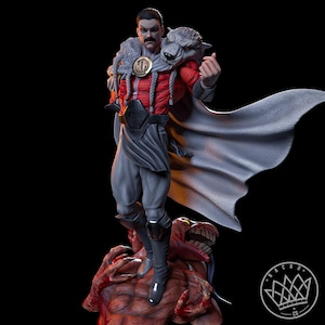 May include: A detailed figurine of a character in a red and gray outfit, cape, and wolf head shoulder piece. The figure stands atop a red monster with sharp teeth. The character has a mustache and is making a hand gesture.
