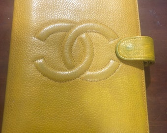 Yellow Chanel agenda mm size. Notebook