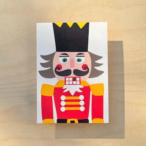 Weihnachtskarte Nussknacker mit Goldzahn / Variante Postkarte oder Schraubenkarte / Goldzahn von Hand geklebt