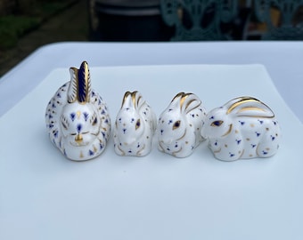 A Selection of Royal Crown Derby Fine Bone China Paperweights Including 2 Mother Rabbits and 3 Baby Rabbits, With Silver and 2 Gold Stoppers